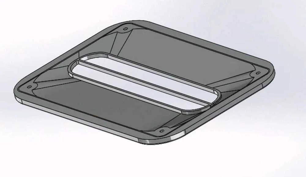 CAD model — the housing frame with tapered air channel and magnet pockets at each corner