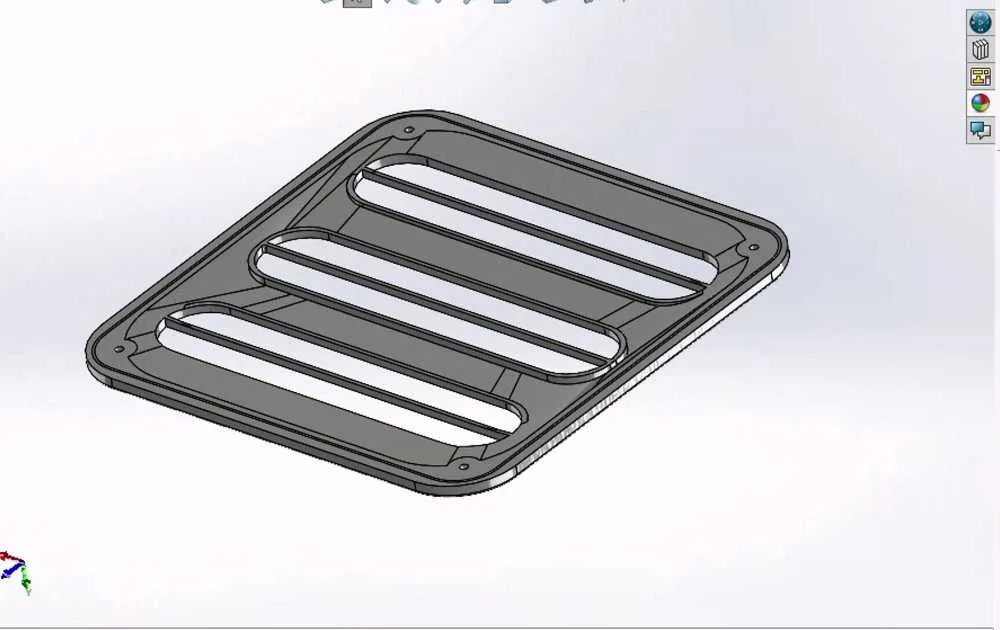 SolidWorks model — louver faceplate with three slot apertures, isometric view